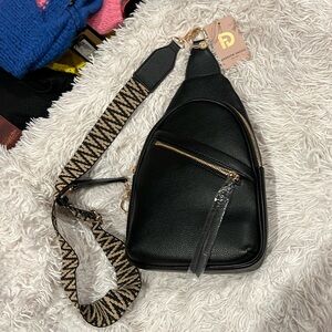 Black Crossbody with guitar strap, New with tags